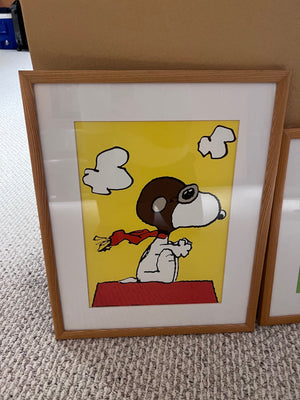 2 Framed Peanuts Prints