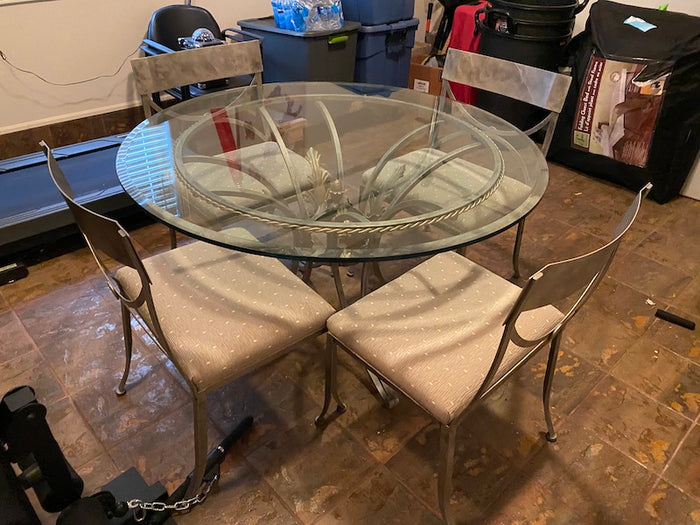 Round glass dining table deals with metal base