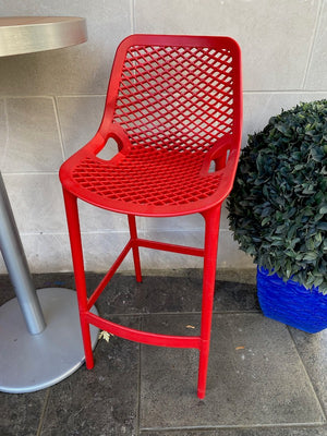 2 Red Siesta Air Bar Stools + Round Cruiser Table