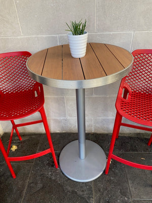 2 Red Siesta Air Bar Stools + Round Cruiser Table