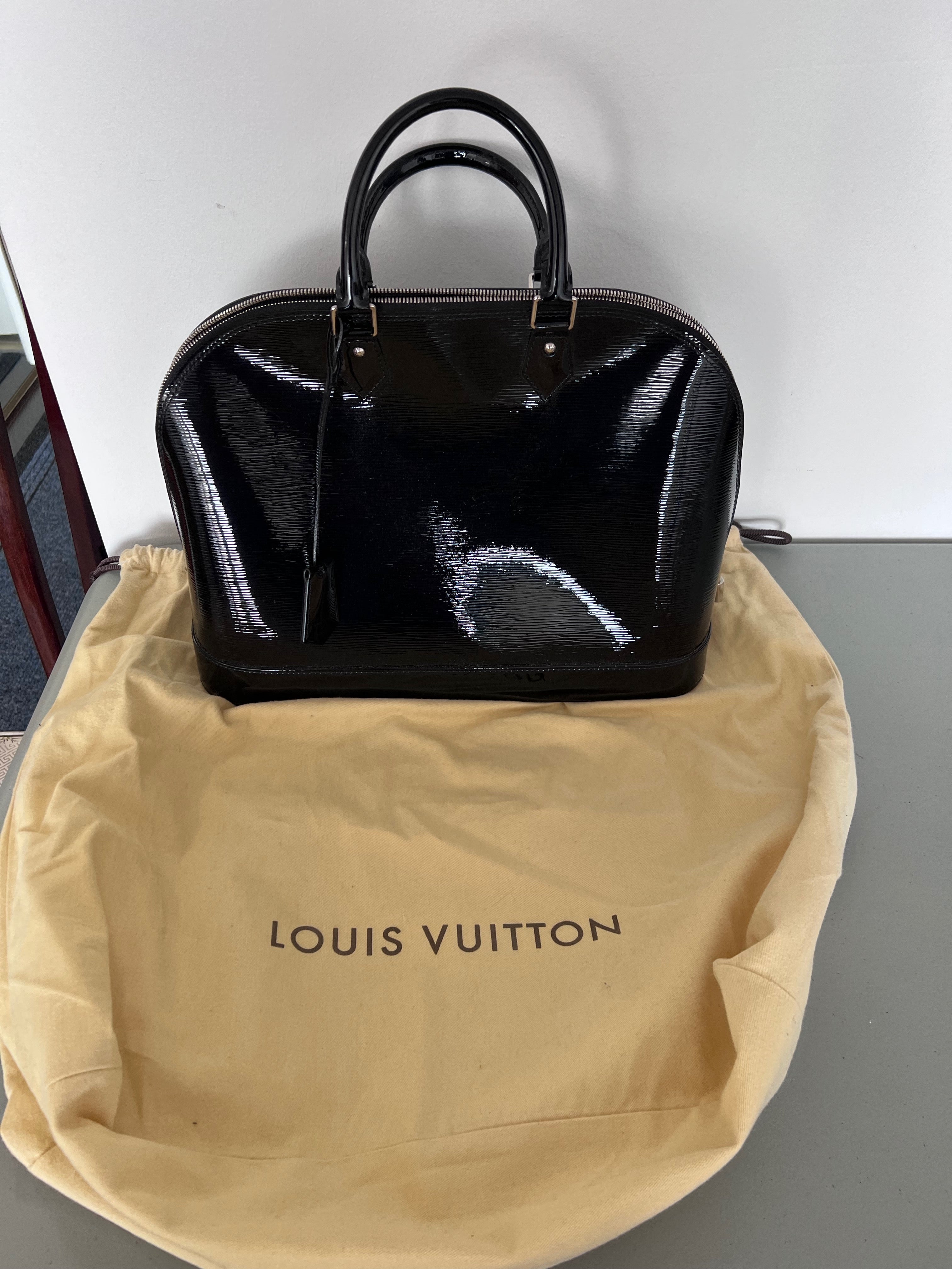 Louis Vuitton Black Electric Epi Leather Alma PM – Sell My Stuff Canada -  Canada's Content and Estate Sale Specialists