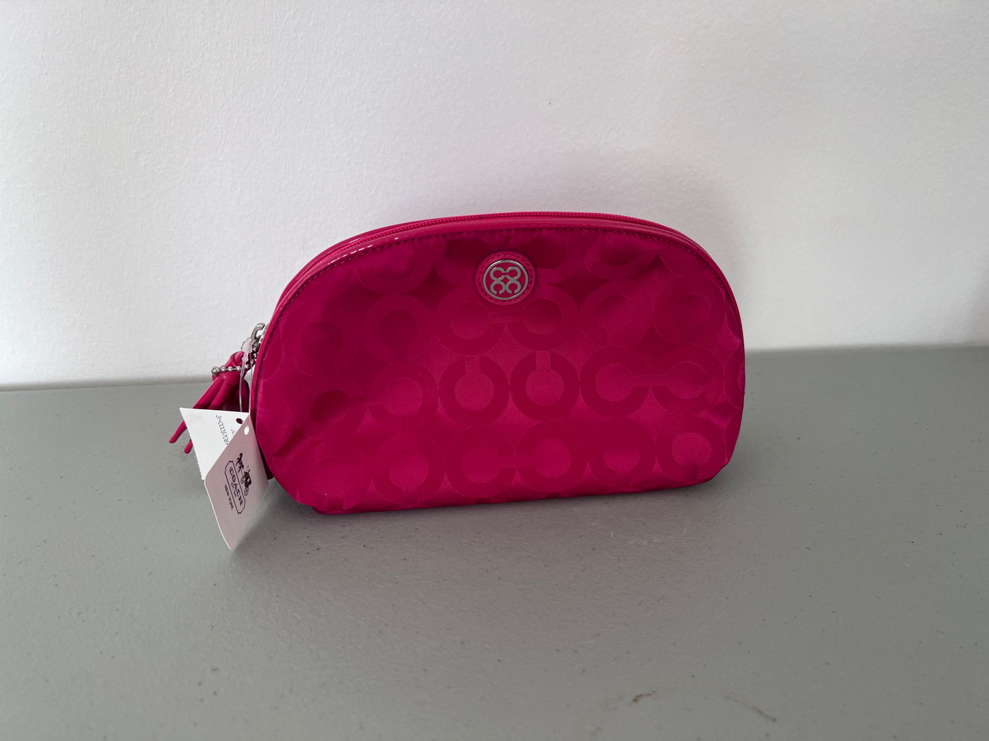 Coach pink discount cosmetic bag